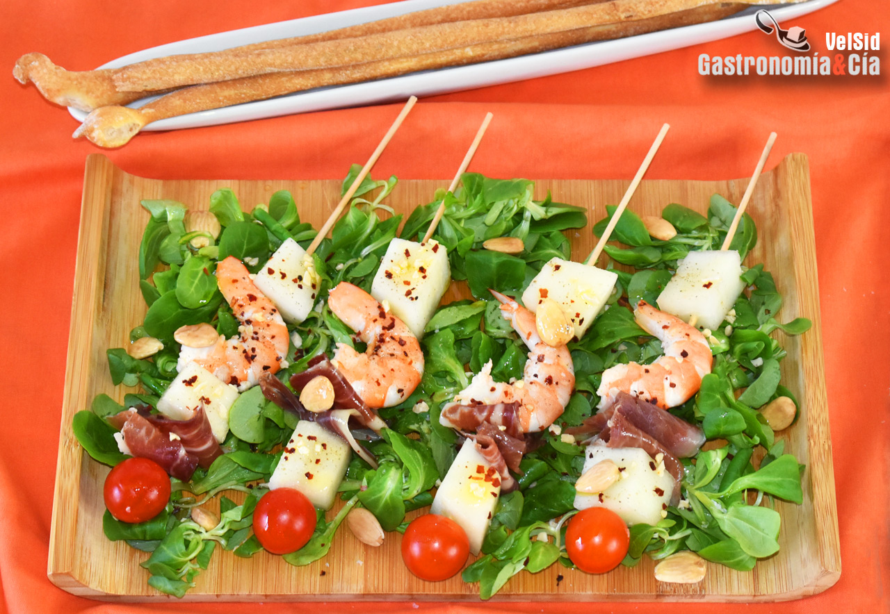 Brocheta de langostinos, jamón ibérico y melón