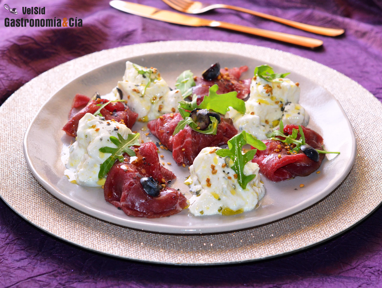 Carpaccio de buey con mozzarella marinada