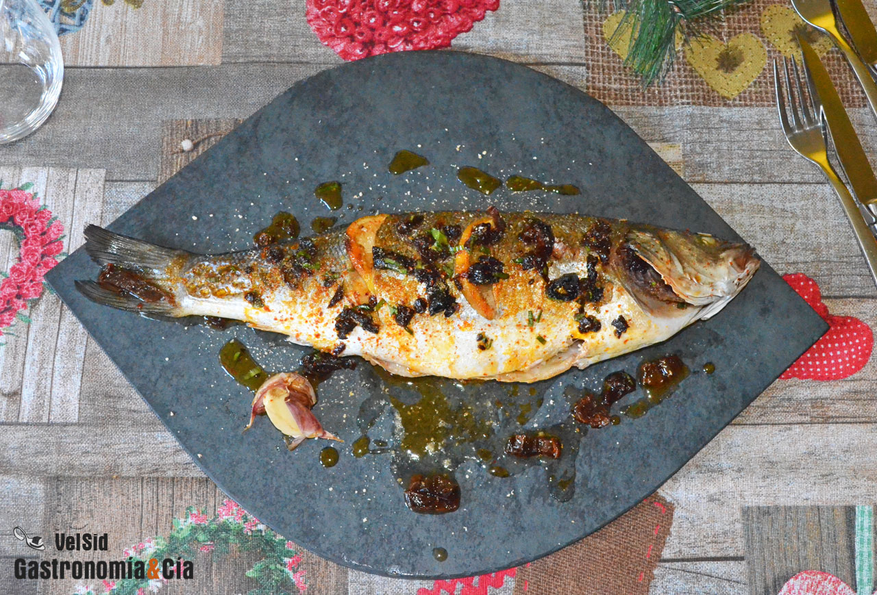 Lubina al horno con txacolí y aceite de tomate seco ñor
