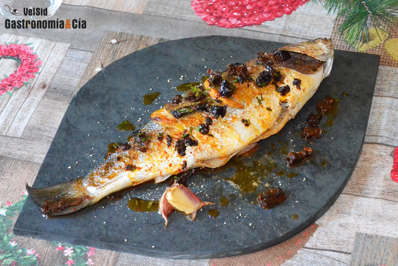 Lubina al horno con txacolí y aceite de tomate seco ñor