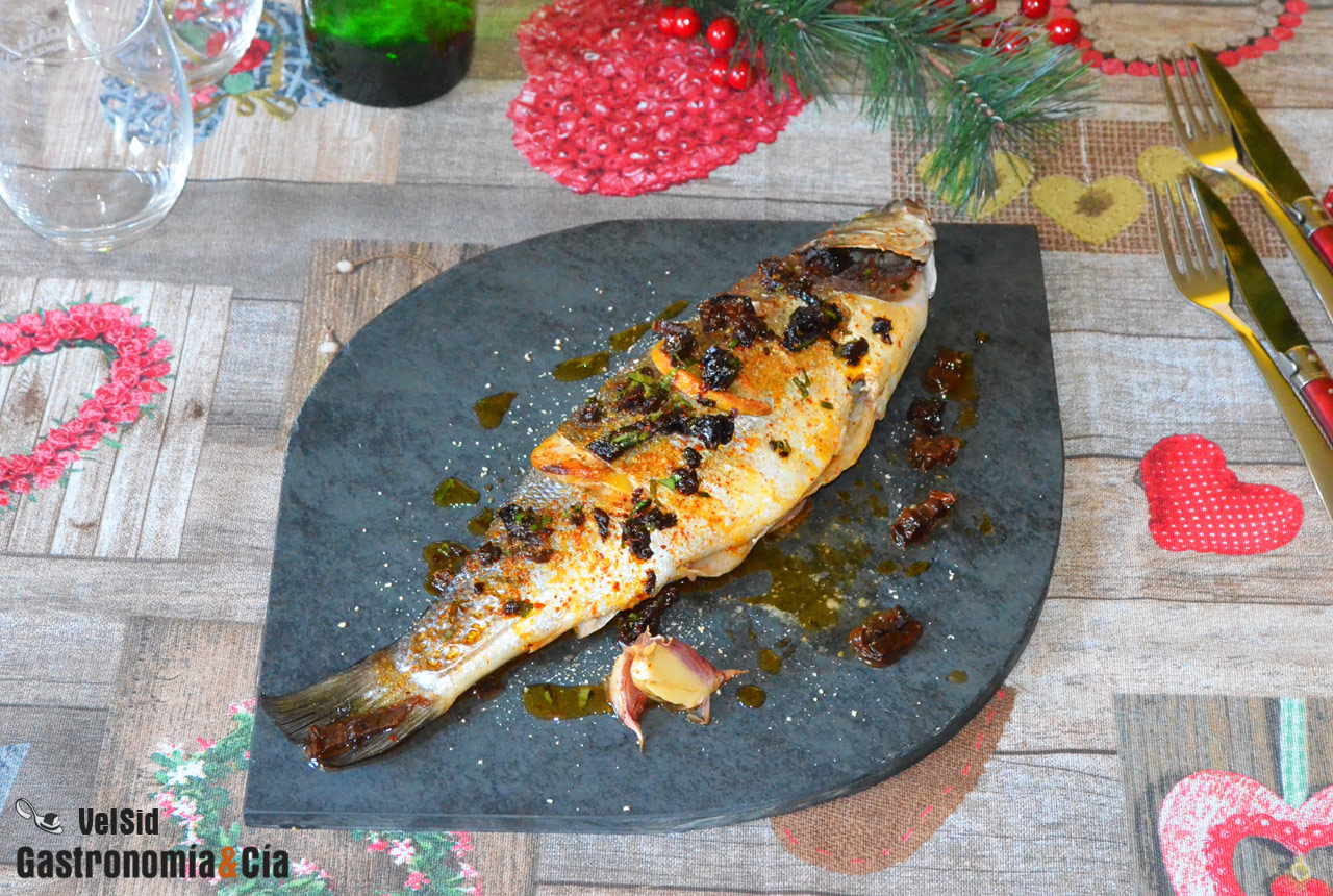 Lubina al horno con txacolí y aceite de tomate seco ñor