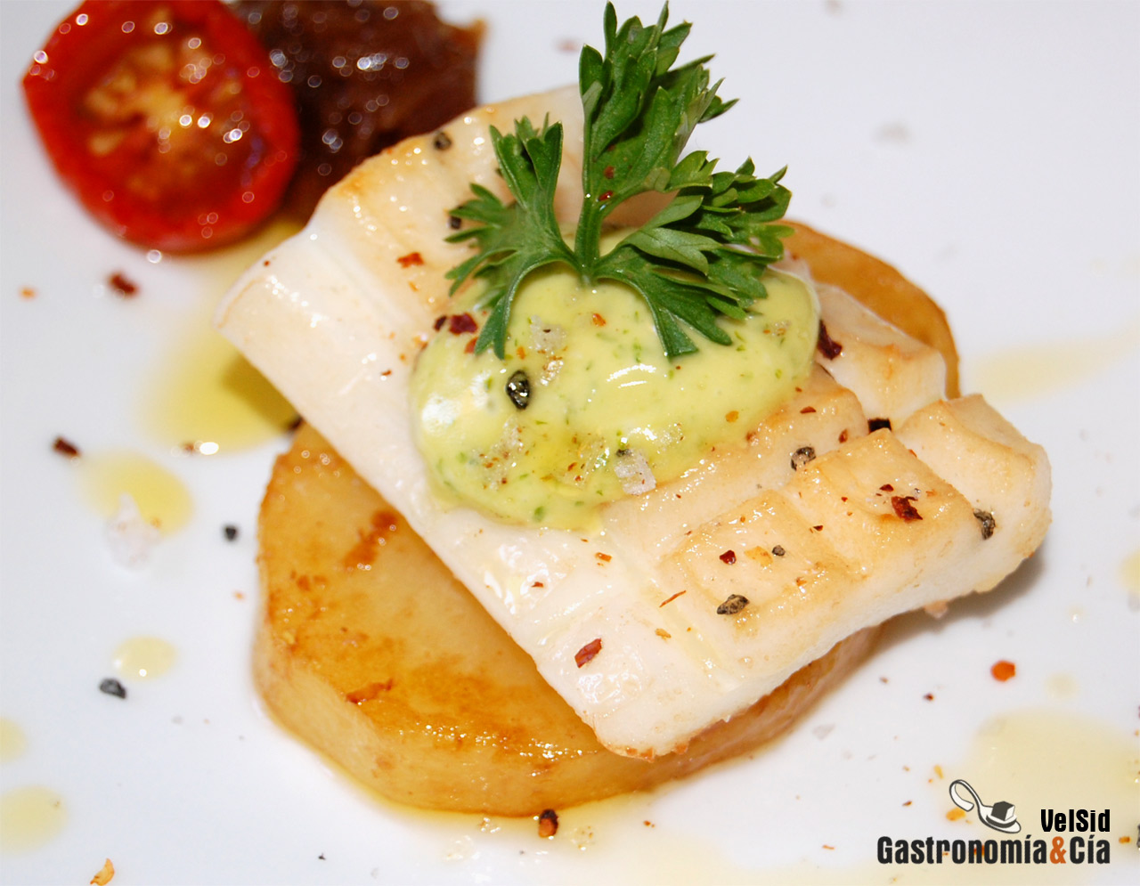 Patatas confitadas con sepia