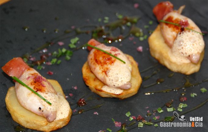 Patata confitada con chipirón relleno de jamón y aire d