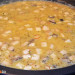 Arroz al azafrán con setas de cardo y piñones