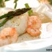 Bacalao con gambas, berenjena y romesco