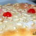 Coca de San Juan con crema y piñones