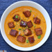 Crema de zanahoria al curry con leche de coco y tempeh 