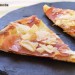 Pizza blanca con cebolla, jamón y parmesano