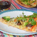Pizza vegetariana con aguacate y nueces
