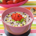 Porridge con fresas calientes