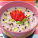 Porridge con fresas calientes