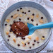 Porridge con puré de plátano y crema de chocolate y cac