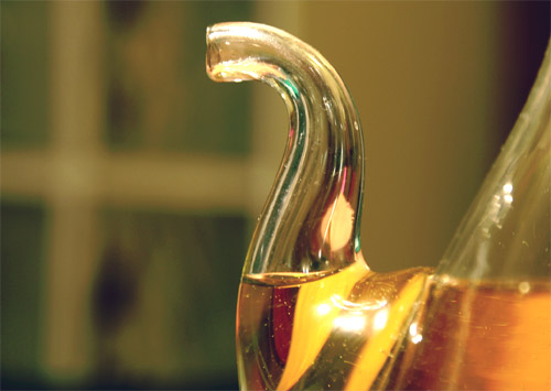 Aceite de oliva en botellas con tapón irrellenable en bares y restaurantes