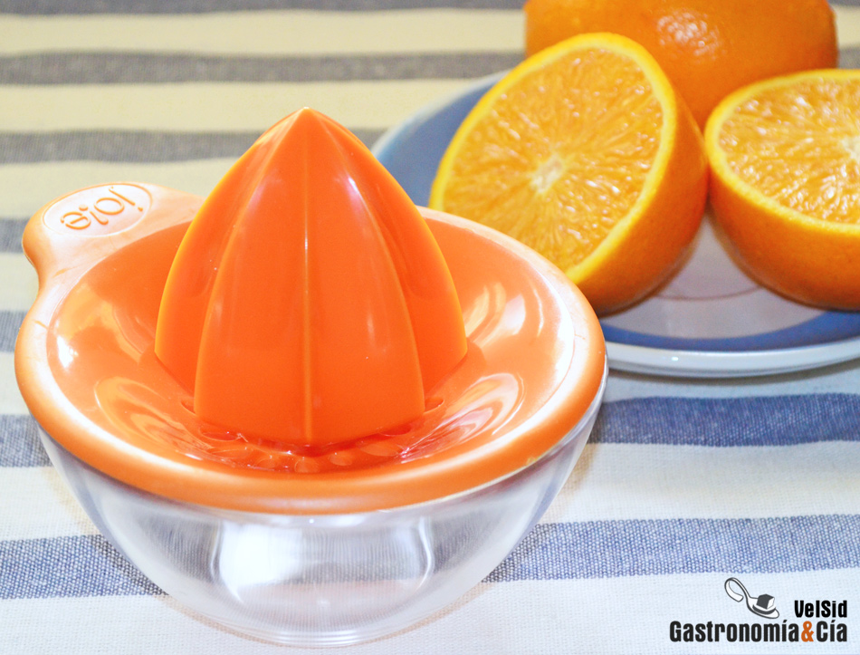 Exprimidor de naranjas eléctrico - naranja - alimentación manual